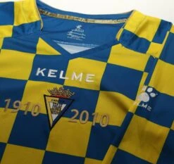 2010/11 CADIZ Vintage Kelme Long Sleeve Special Anniversary Football Shirt (L)(2010 11 Cadiz Vintage Kelme Long Sleeve Special Anniversary Football Shirt L) 9 2010/11 CADIZ Vintage Kelme Long Sleeve Special Anniversary Football Shirt (L)(2010 11 Cadiz Vintage Kelme Long Sleeve Special Anniversary Football Shirt L) -Football Shirt Collective 2010 11 cadiz vintage kelme long sleeve special anniversary football shirt l 1181561582